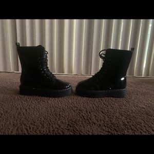 Black patent leather combat boot
